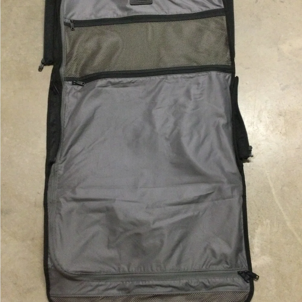Tumi Black Men's Travel Duffel with Front Zip Pocket and Carry Handles